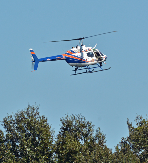 Police helicopter circling over Cypress Lakes